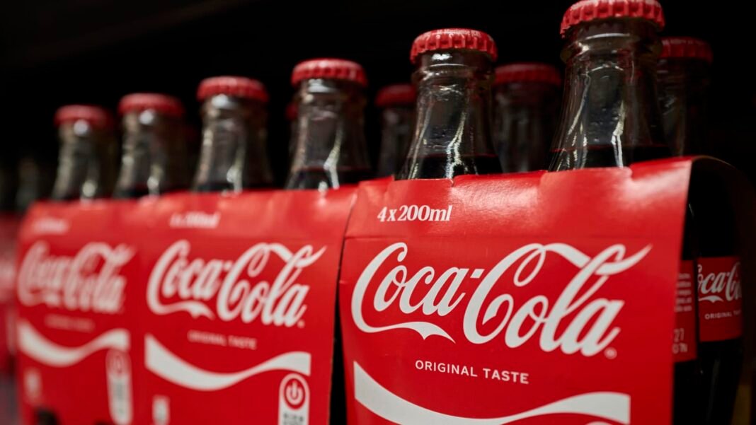 Coca-Cola hikes earnings outlook, even as it sees lackluster demand in North America