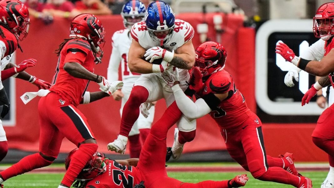 Giants' Cam Skattebo, John Harbaugh object to lowering helmet penalty